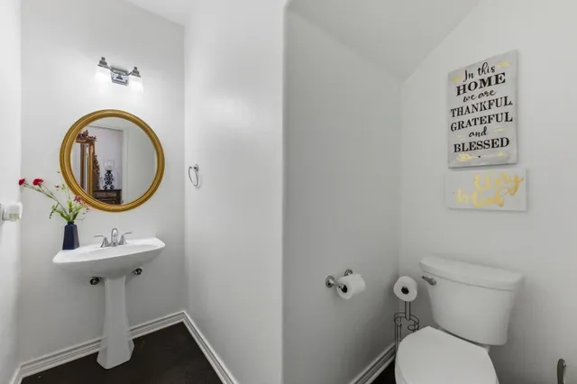 a bathroom with a toilet and a sink