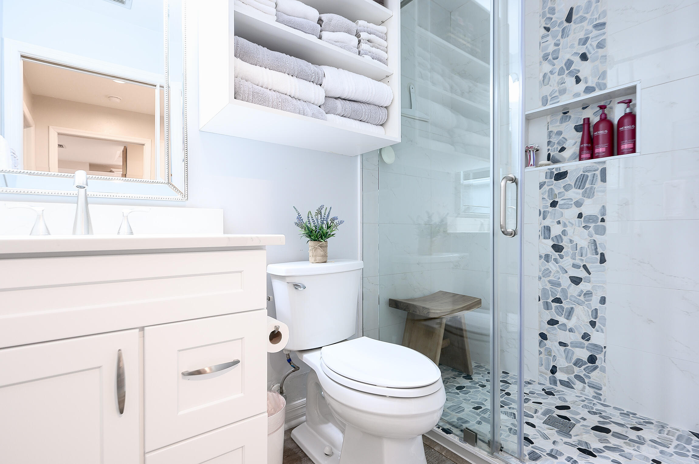 8660 Cedar Hammock Circle, Unit 314 Naples, FL 34112 - Photo 12 of 31 a bathroom with a toilet sink and shower