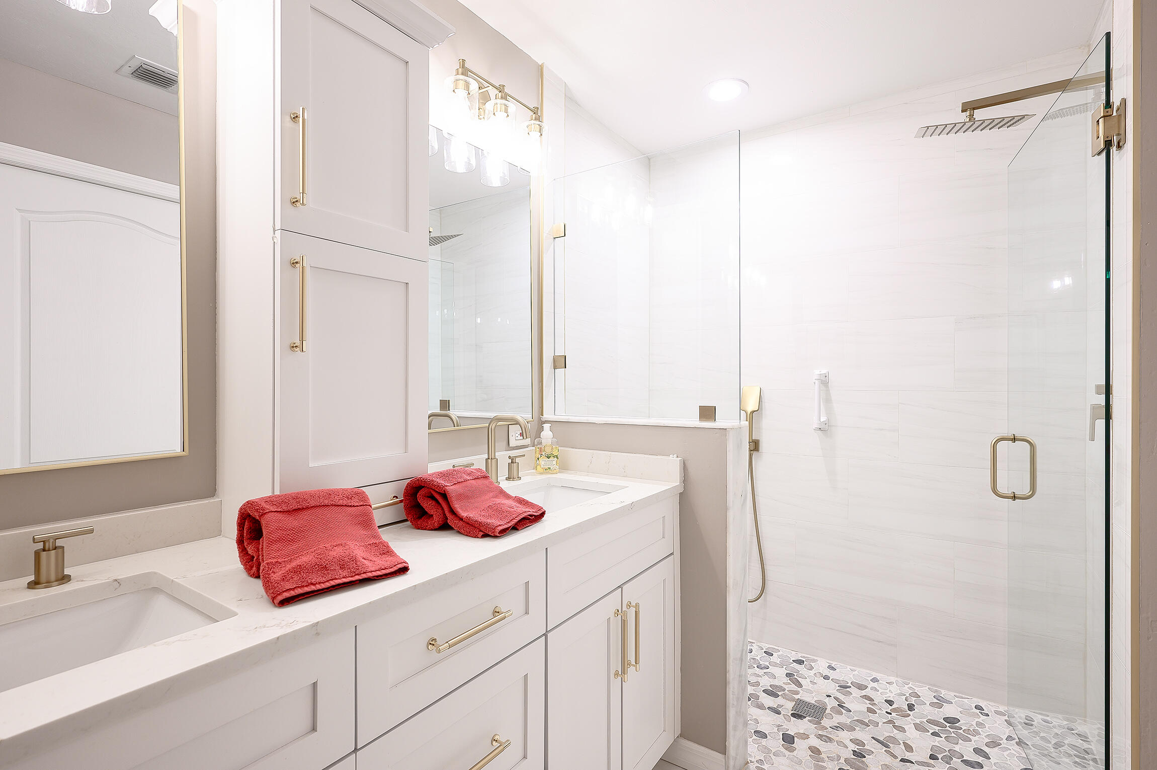 8660 Cedar Hammock Circle, Unit 314 Naples, FL 34112 - Photo 9 of 31 a bathroom with a granite countertop sink and a shower