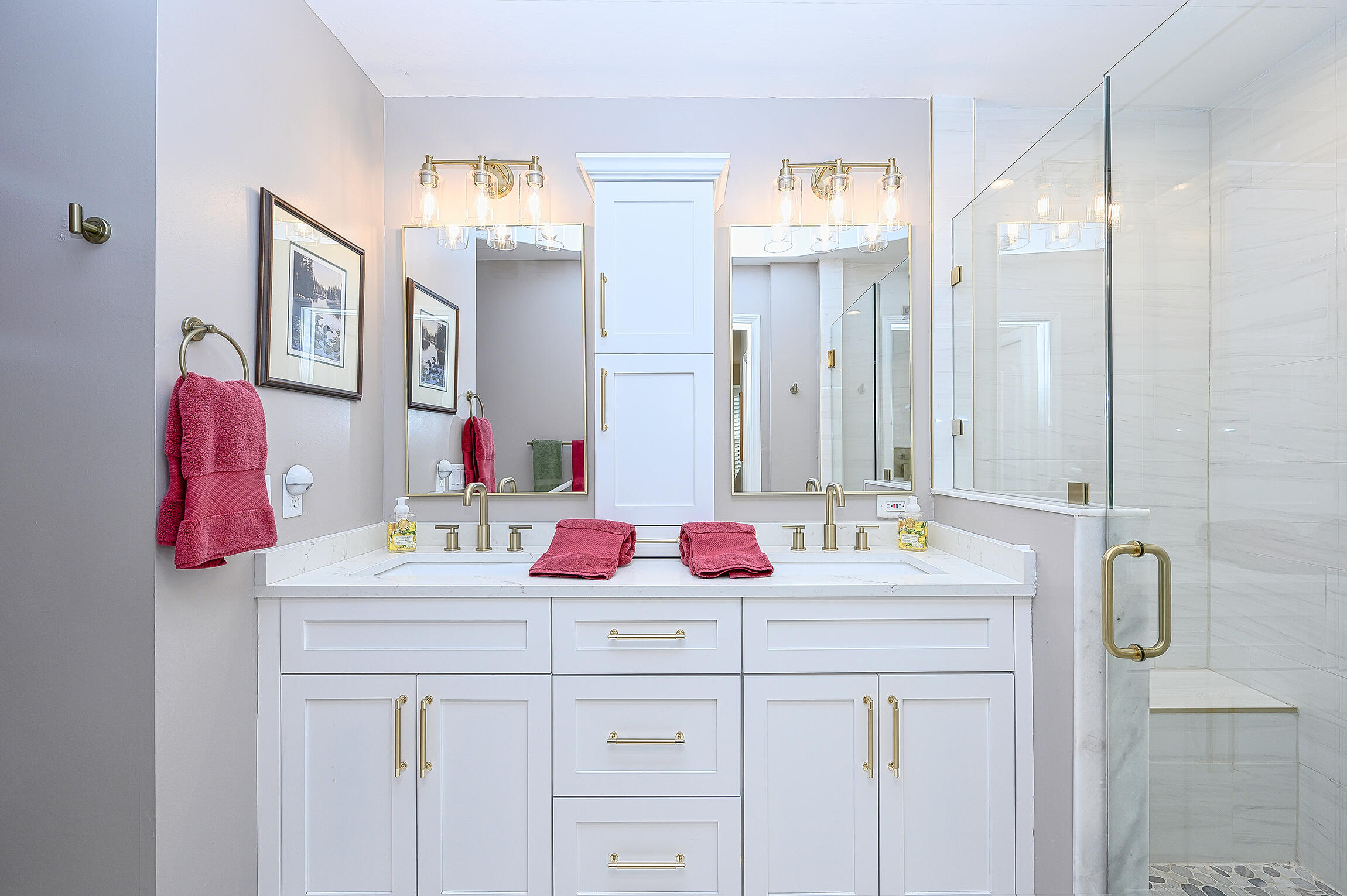 8660 Cedar Hammock Circle, Unit 314 Naples, FL 34112 - Photo 10 of 31 a bathroom with a sink vanity and a mirror