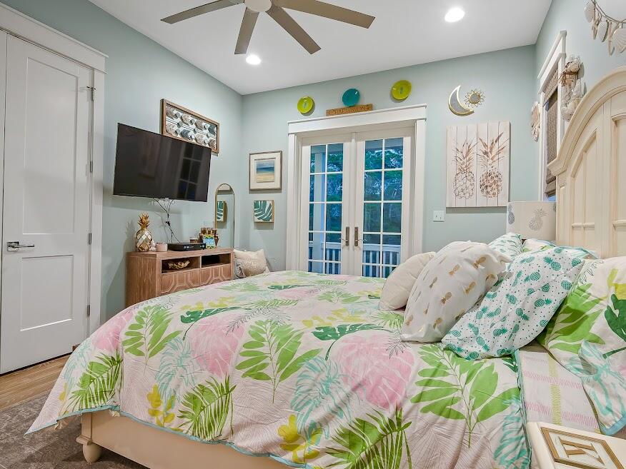 277 Matt's Way Santa Rosa Beach, FL 32459 - Photo 25 of 37 a bedroom with a bed and a flat screen tv