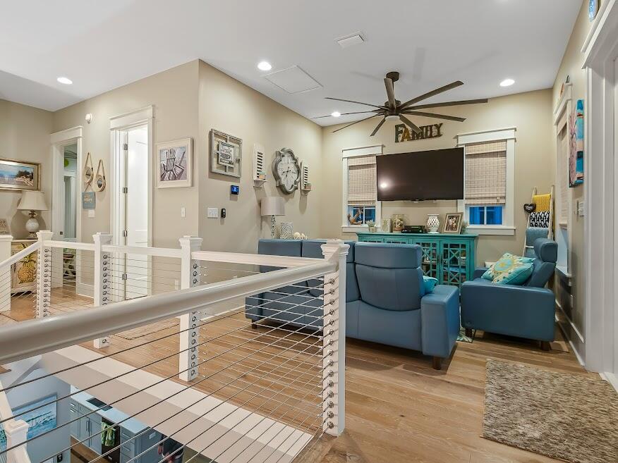 277 Matt's Way Santa Rosa Beach, FL 32459 - Photo 29 of 37 a living room with furniture and a flat screen tv