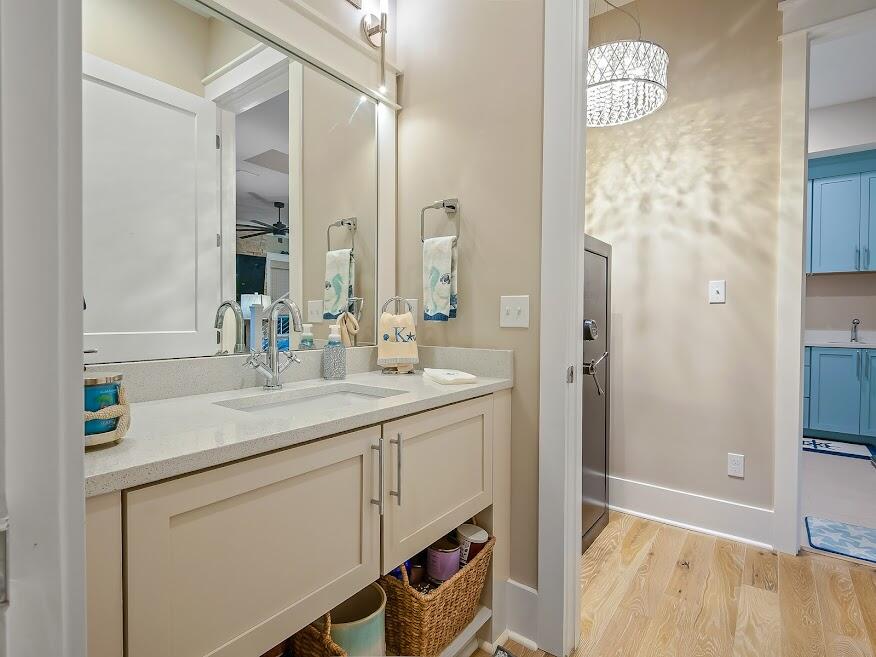 277 Matt's Way Santa Rosa Beach, FL 32459 - Photo 31 of 37 a bathroom with a sink a mirror and a shower