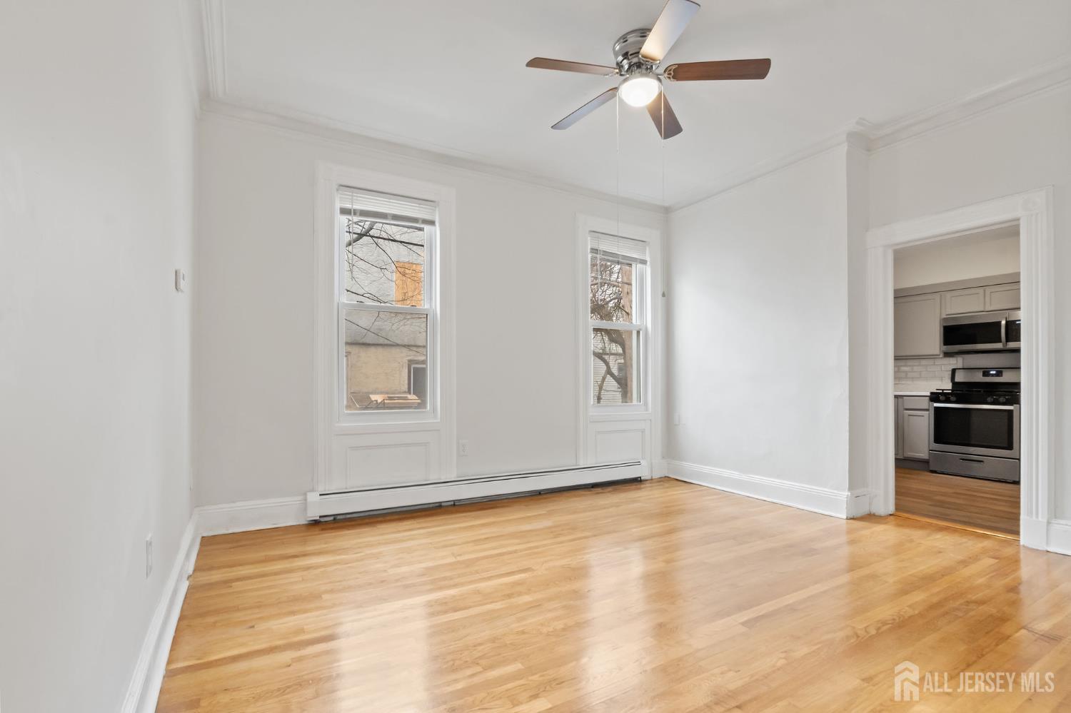 20 Linden Court, Unit 1 Jersey City, NJ 07305 - Photo 12 of 33 a view of empty room with ceiling fan