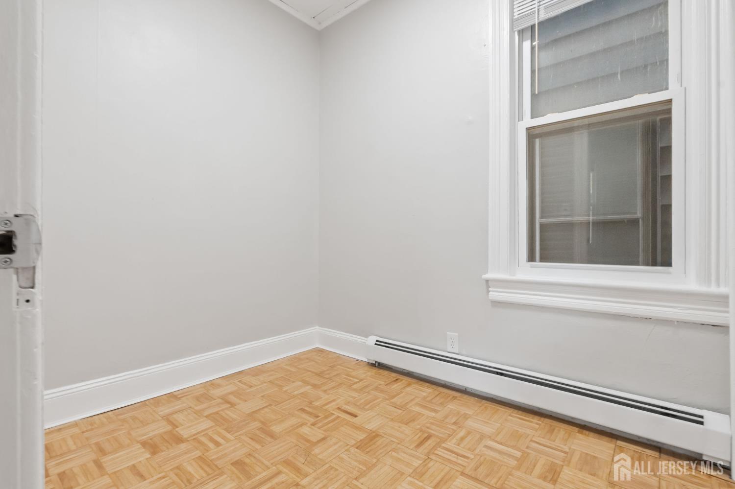20 Linden Court, Unit 1 Jersey City, NJ 07305 - Photo 13 of 33 a view of a window in an empty room