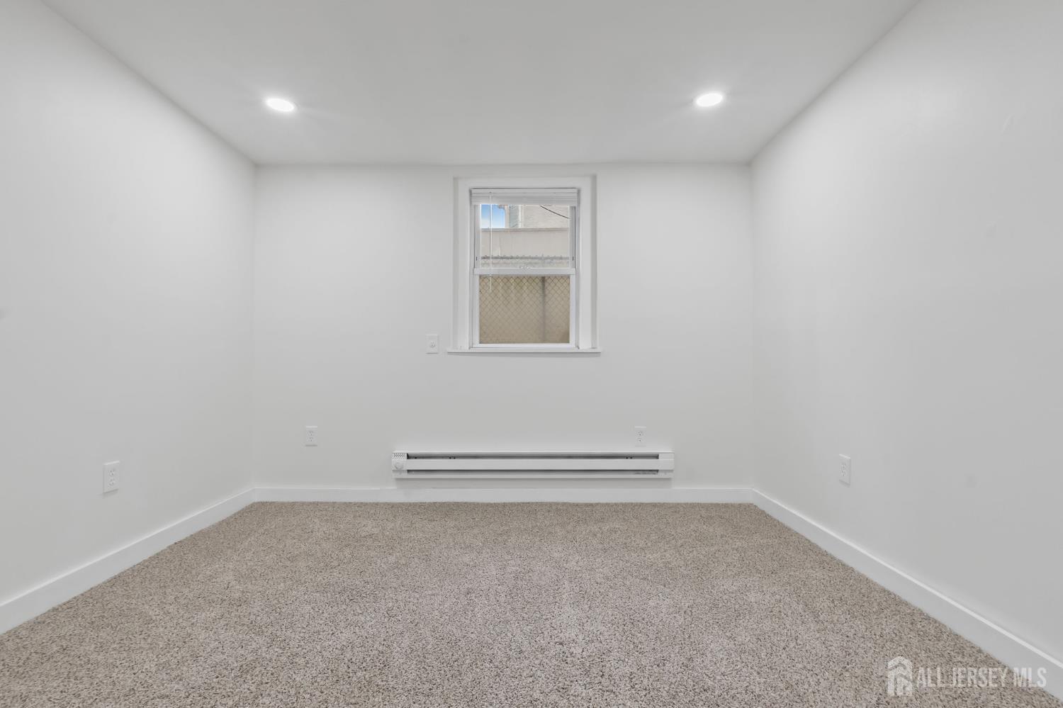 20 Linden Court, Unit 1 Jersey City, NJ 07305 - Photo 26 of 33 an empty room with a window