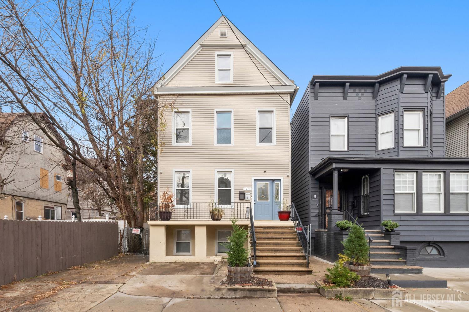 20 Linden Court, Unit 1 Jersey City, NJ 07305 - Photo 33 of 33 a front view of a house with a yard
