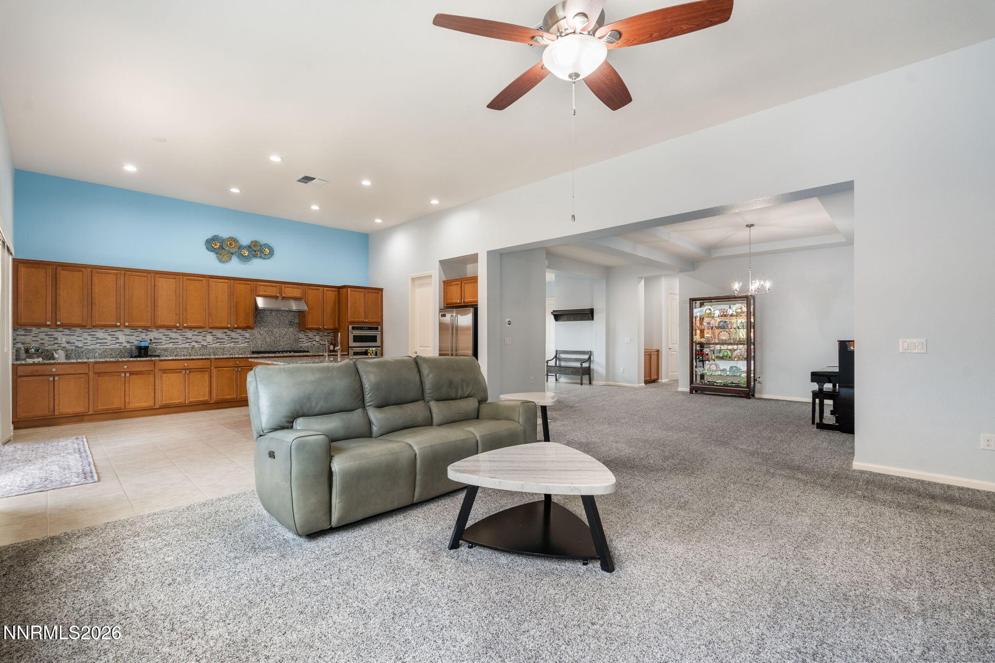 9401 Baldacci Road Reno, NV 89521 - Photo 12 of 42 a living room with furniture and a wooden floor