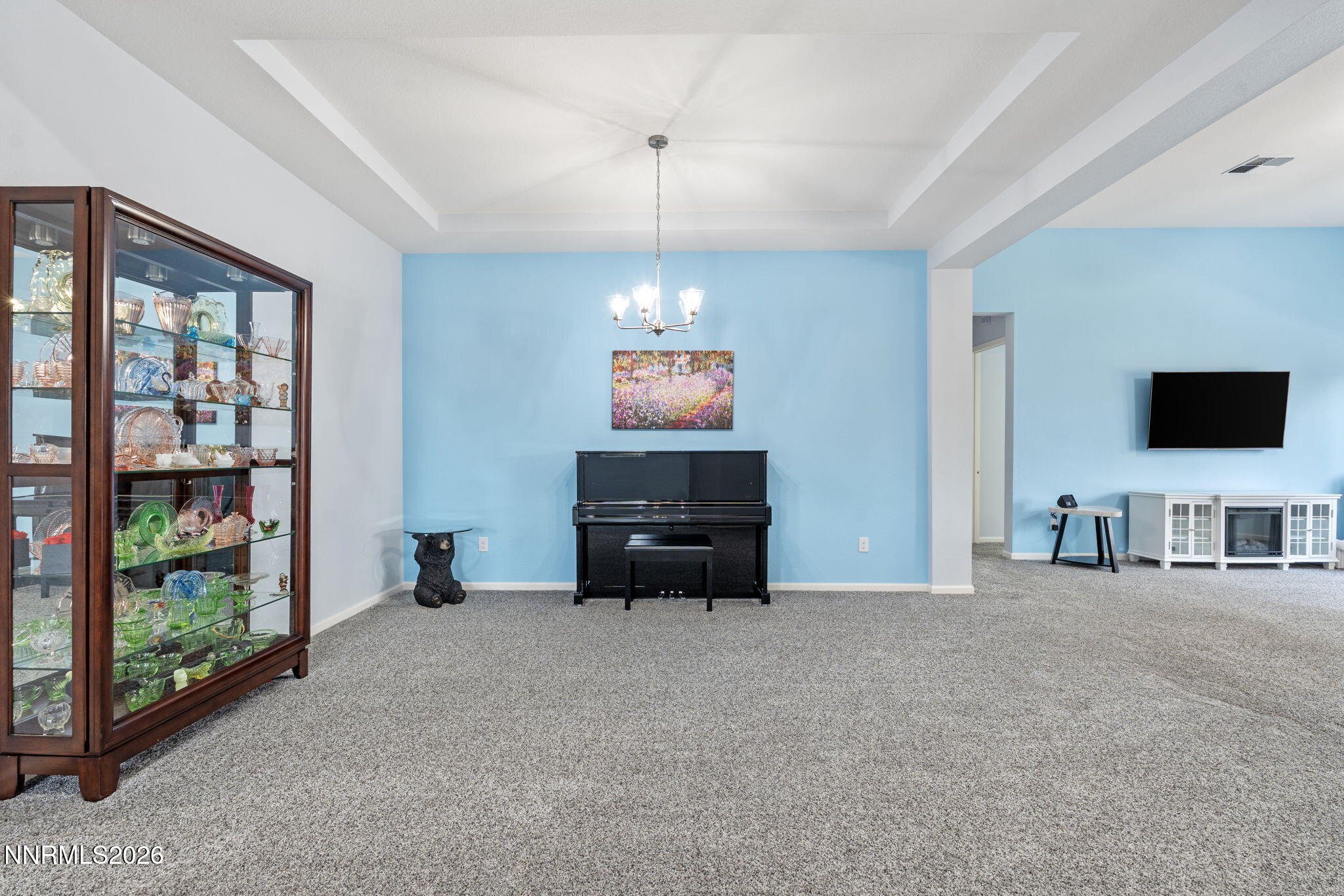 9401 Baldacci Road Reno, NV 89521 - Photo 15 of 42 a living room with furniture and a flat screen tv