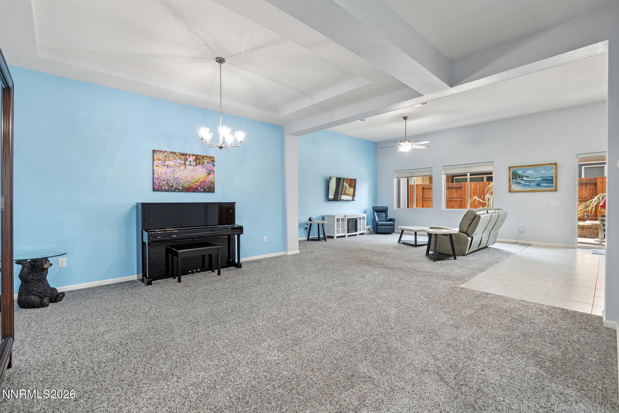 9401 Baldacci Road Reno, NV 89521 - Photo 17 of 42 a living room with furniture and a flat screen tv