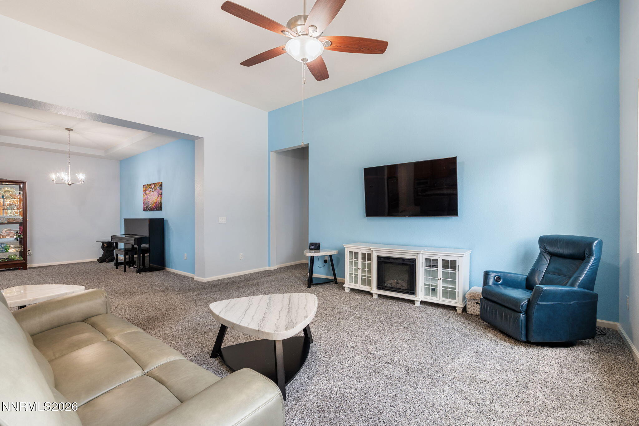9401 Baldacci Road Reno, NV 89521 - Photo 19 of 42 a living room with furniture and a flat screen tv
