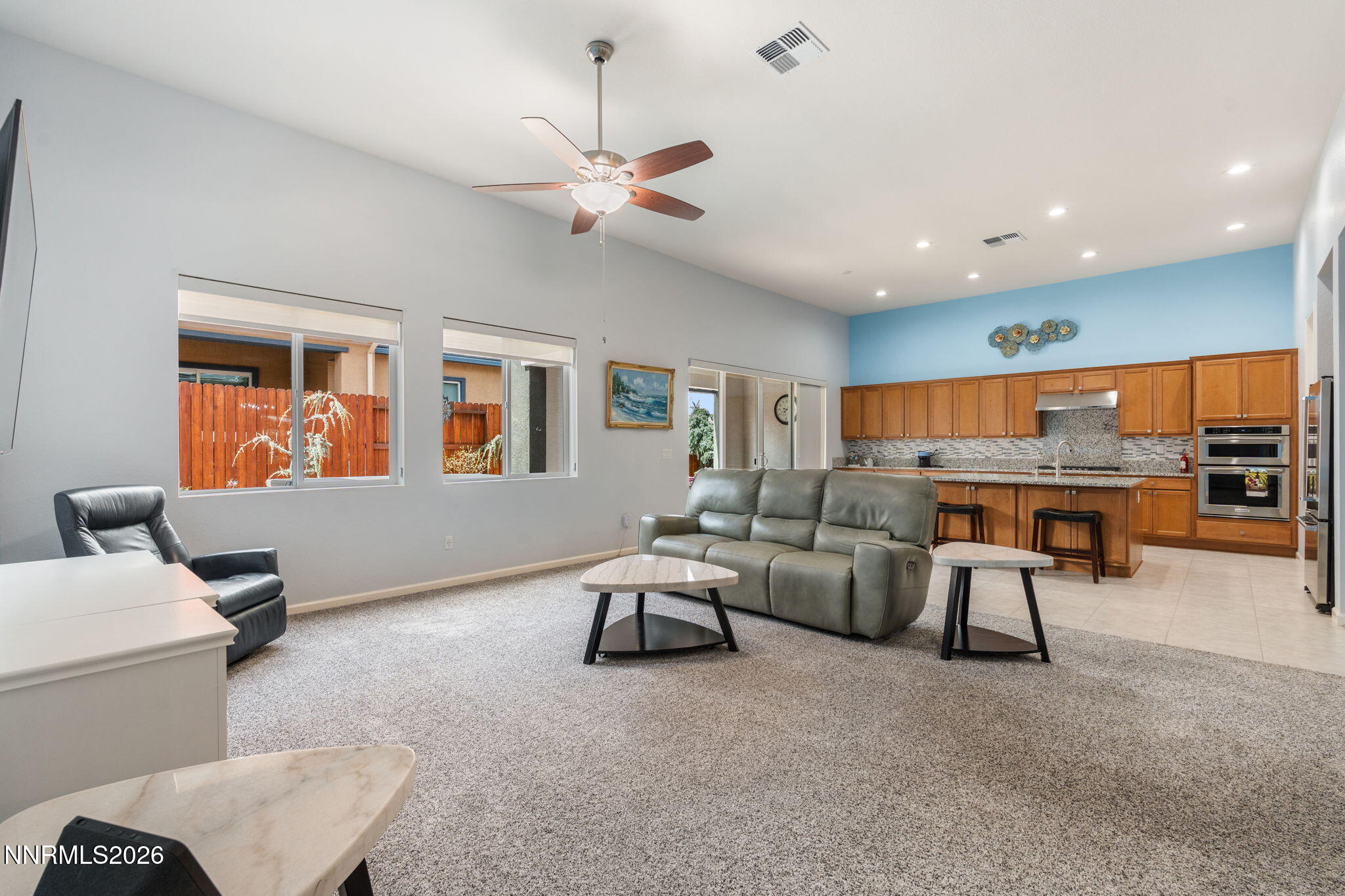 9401 Baldacci Road Reno, NV 89521 - Photo 4 of 42 a living room with furniture and a flat screen tv
