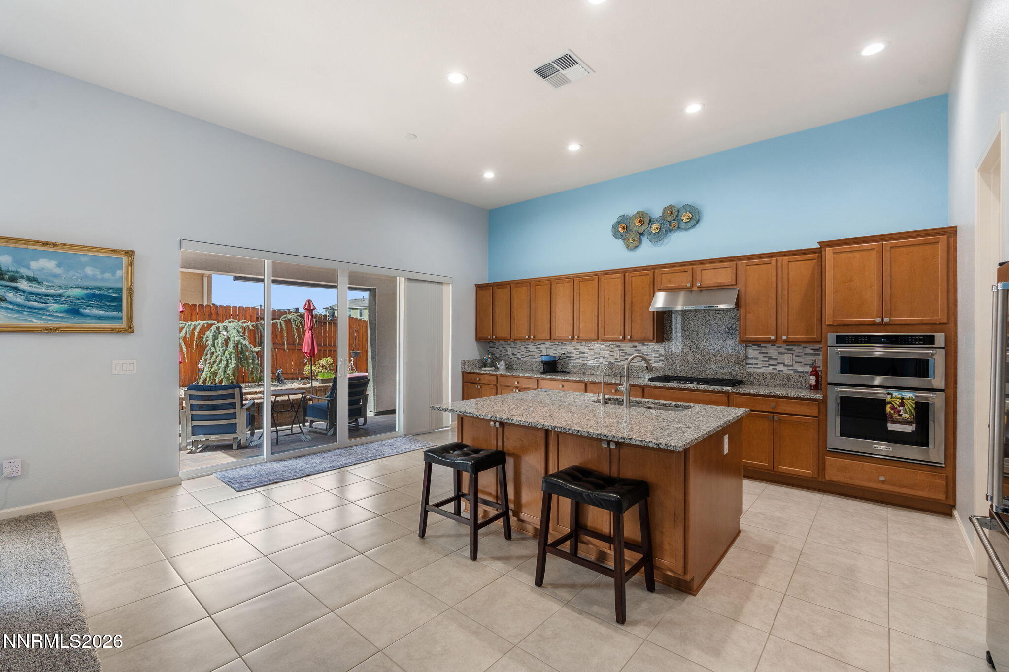 9401 Baldacci Road Reno, NV 89521 - Photo 5 of 42 a kitchen with a table and chairs in it
