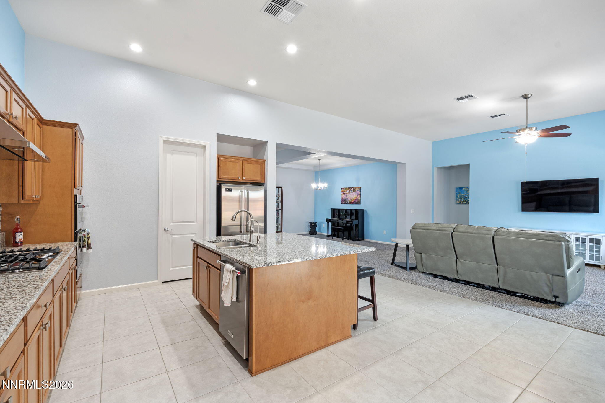 9401 Baldacci Road Reno, NV 89521 - Photo 10 of 42 a living room with furniture and a flat screen tv