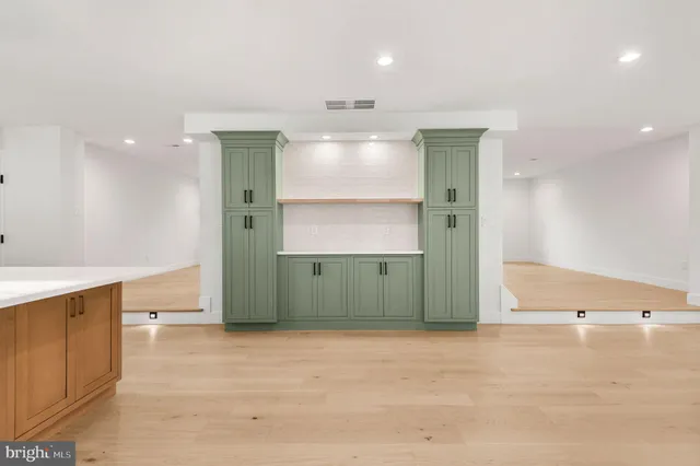 a view of room with cabinets