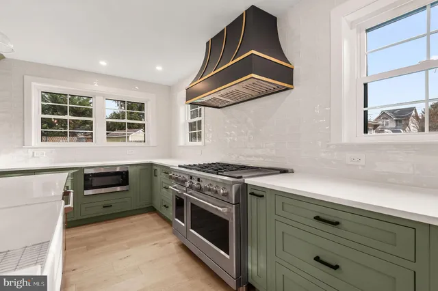 a kitchen with a stove and a cabinet