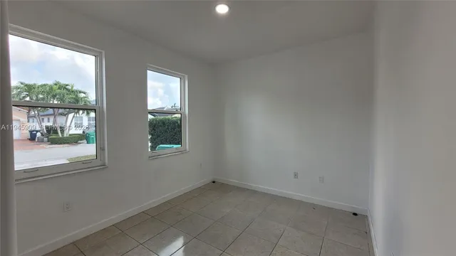 a view of a room that has a window in it