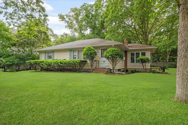 a house view with a garden space