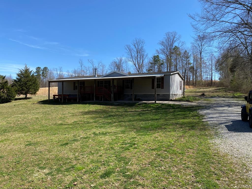 175 Fairview Road Athens, TN 37303 - Photo 1 of 46 a view of a house with a yard