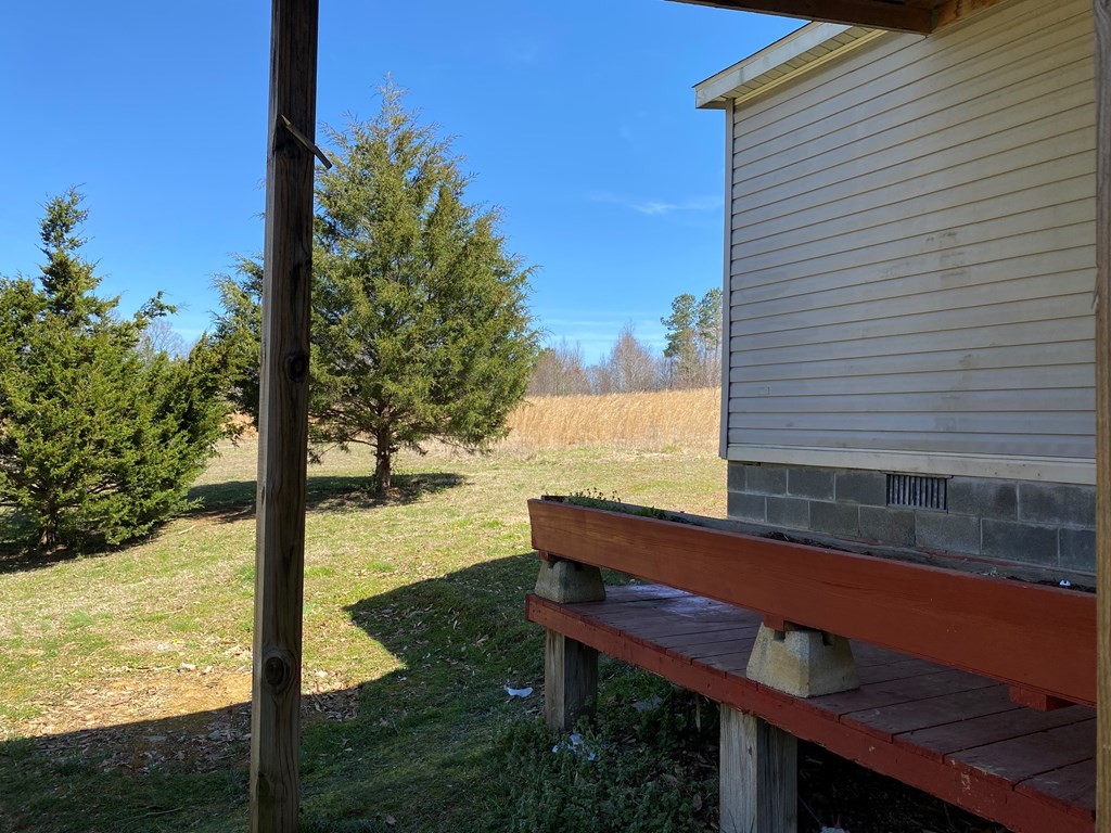 175 Fairview Road Athens, TN 37303 - Photo 13 of 46 a view of a two chairs and table in the patio