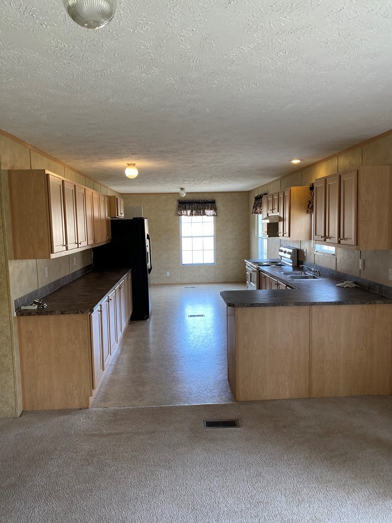 175 Fairview Road Athens, TN 37303 - Photo 22 of 46 a kitchen with granite countertop lots of counter top space