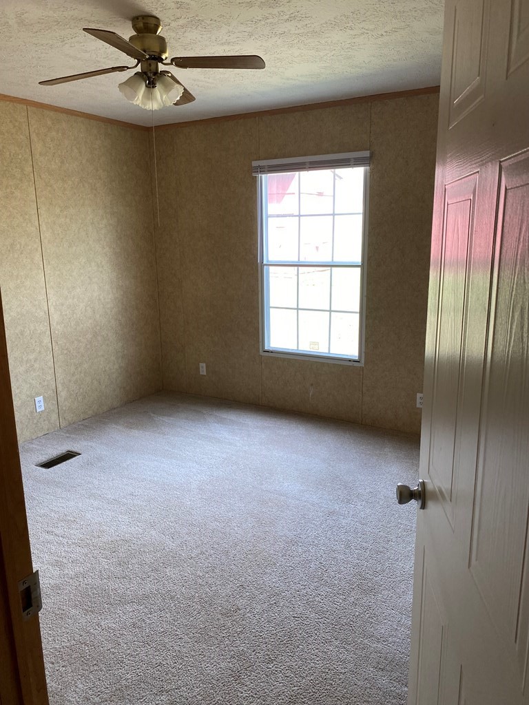 175 Fairview Road Athens, TN 37303 - Photo 39 of 46 a view of an empty room with a window