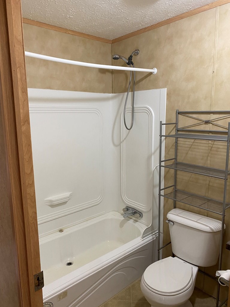 175 Fairview Road Athens, TN 37303 - Photo 41 of 46 a bathroom with a toilet and a shower