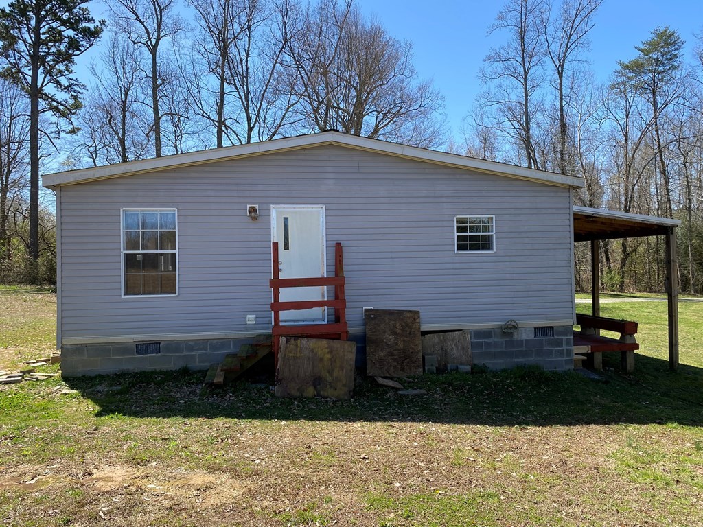 175 Fairview Road Athens, TN 37303 - Photo 6 of 46 a backyard of a house with seating space