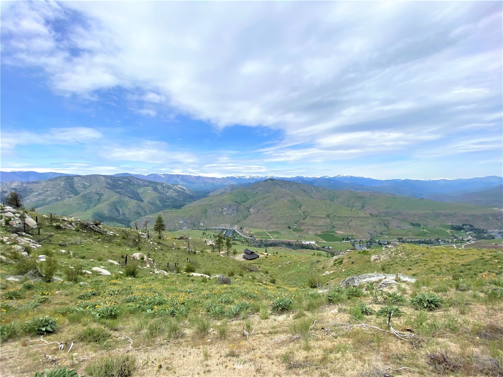 0 Sky Ridge Road Pateros, WA 98846 - Photo 15 of 39 a view of a mountain range with lush green forest