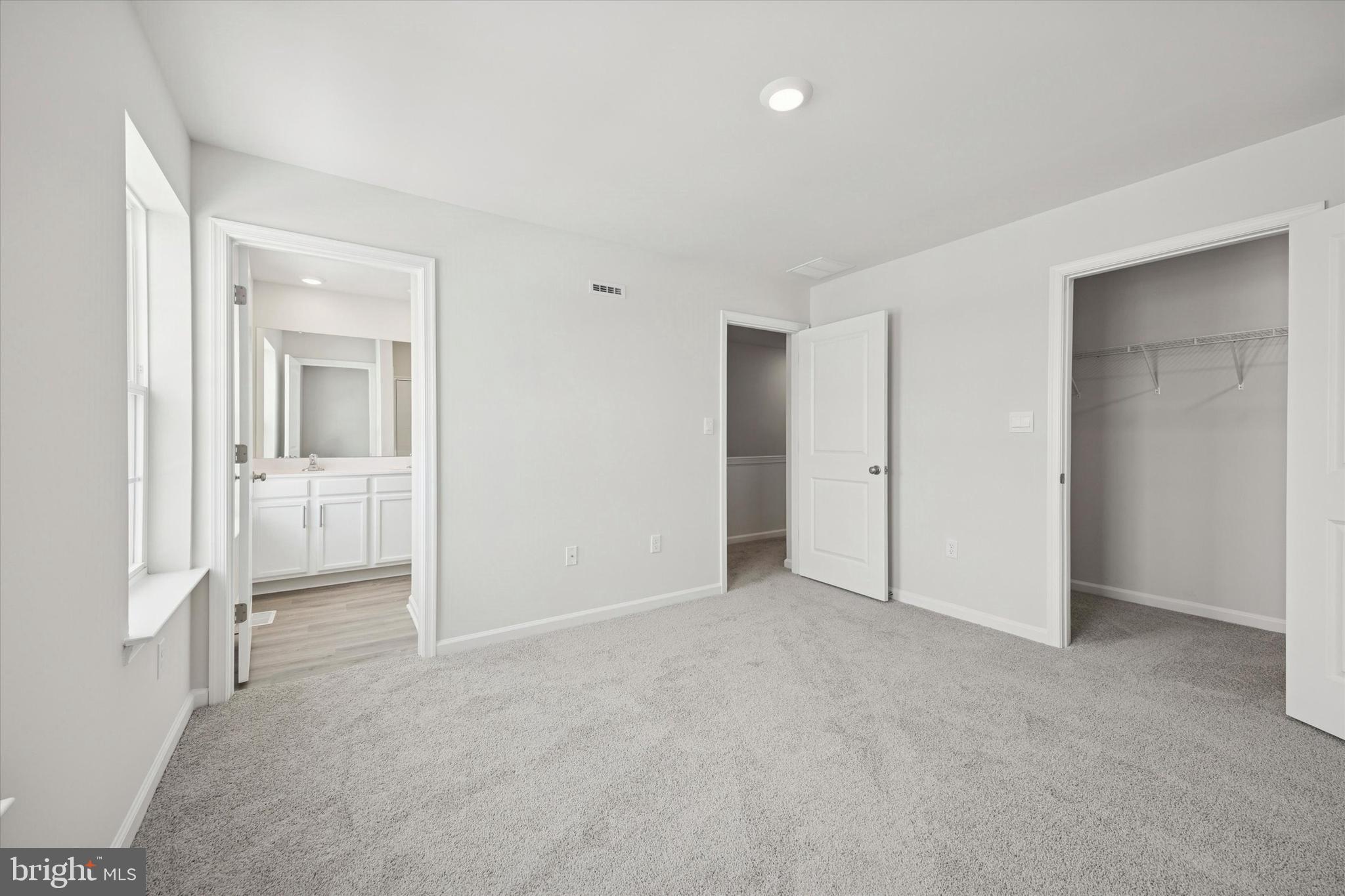 163 Sandy Rdg Road Sicklerville, NJ 08081 - Photo 20 of 30 an empty room with a bathroom and a sink