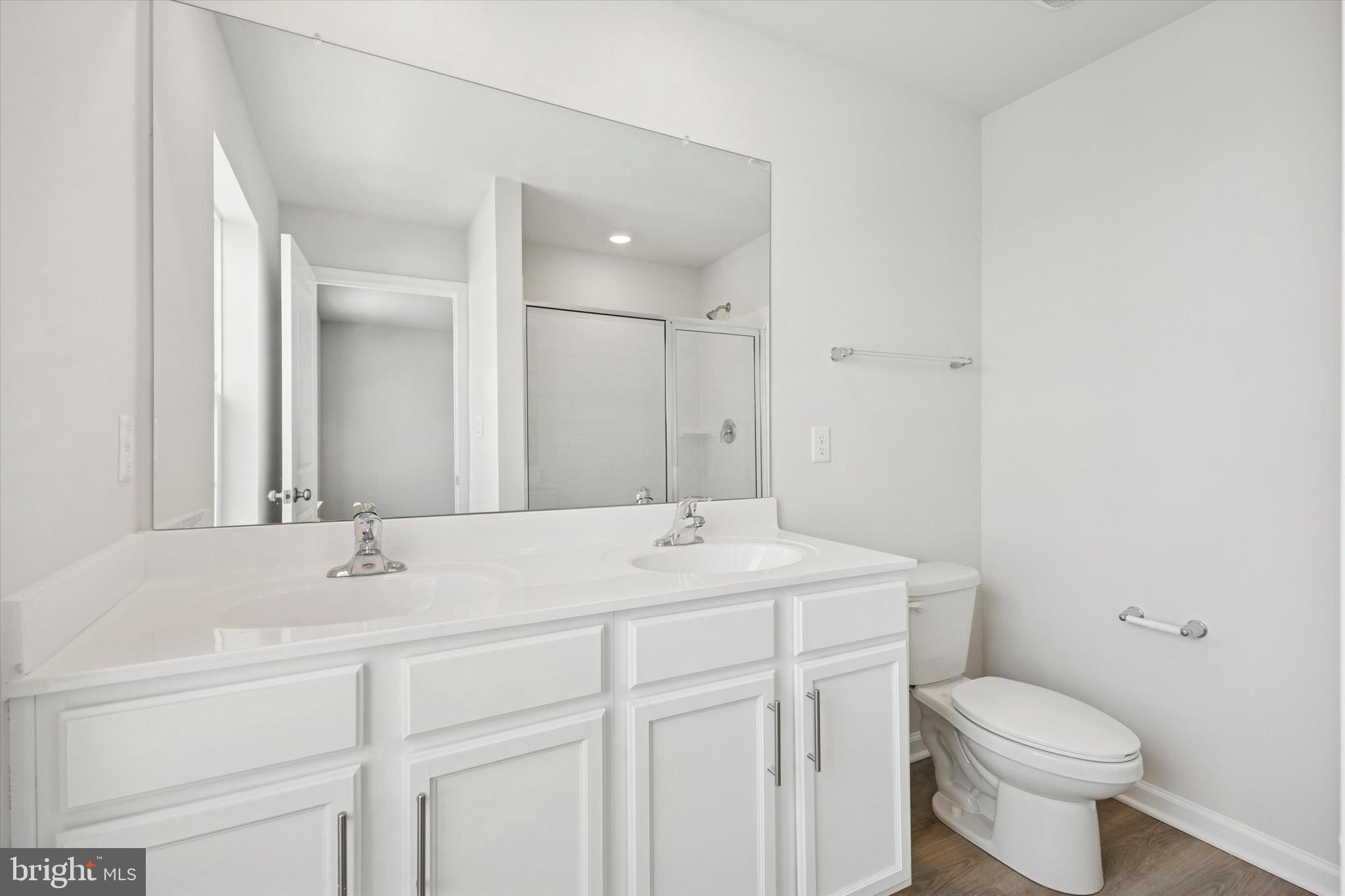 163 Sandy Rdg Road Sicklerville, NJ 08081 - Photo 21 of 30 a bathroom with a sink toilet and vanity