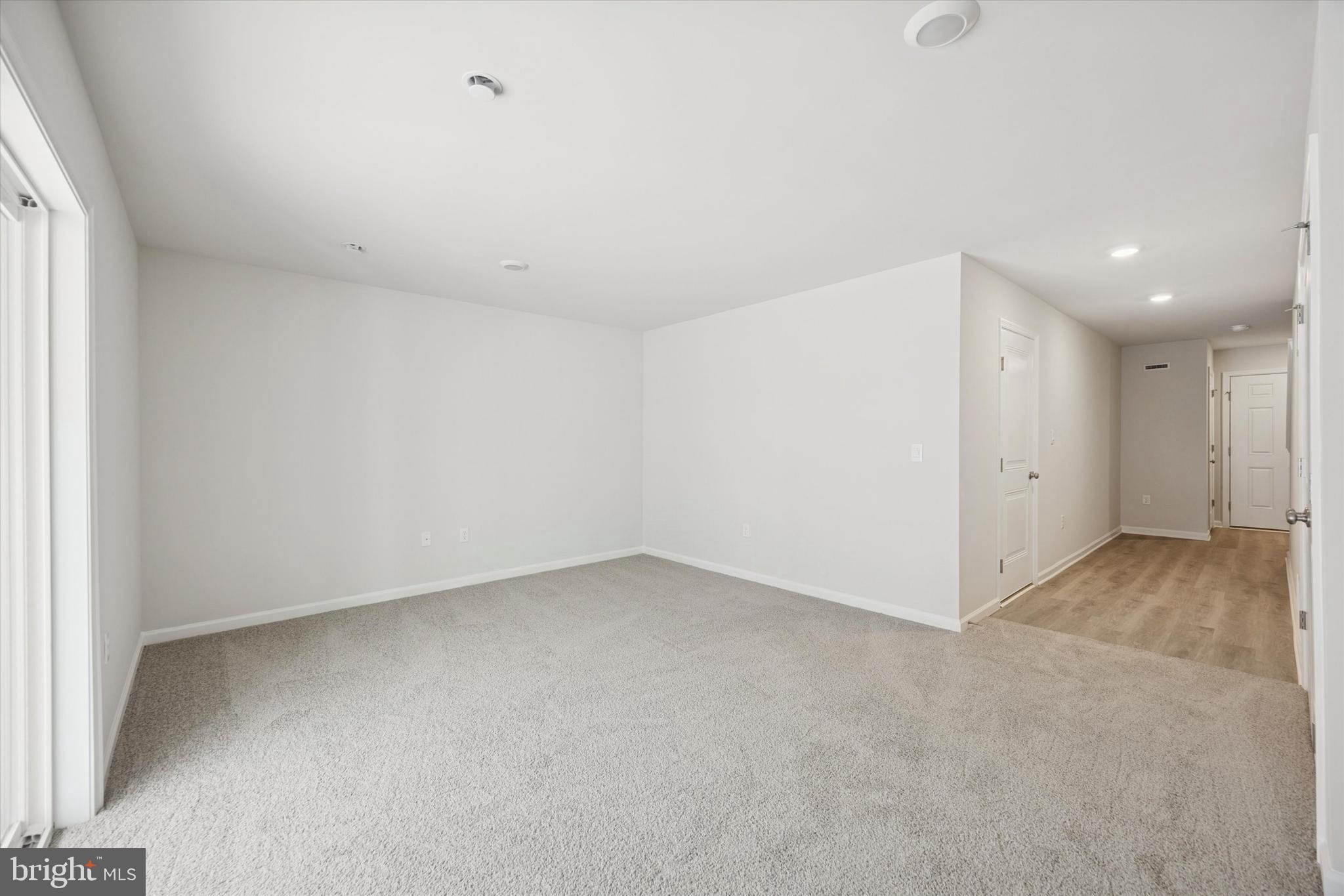 163 Sandy Rdg Road Sicklerville, NJ 08081 - Photo 28 of 30 an empty room with a natural light