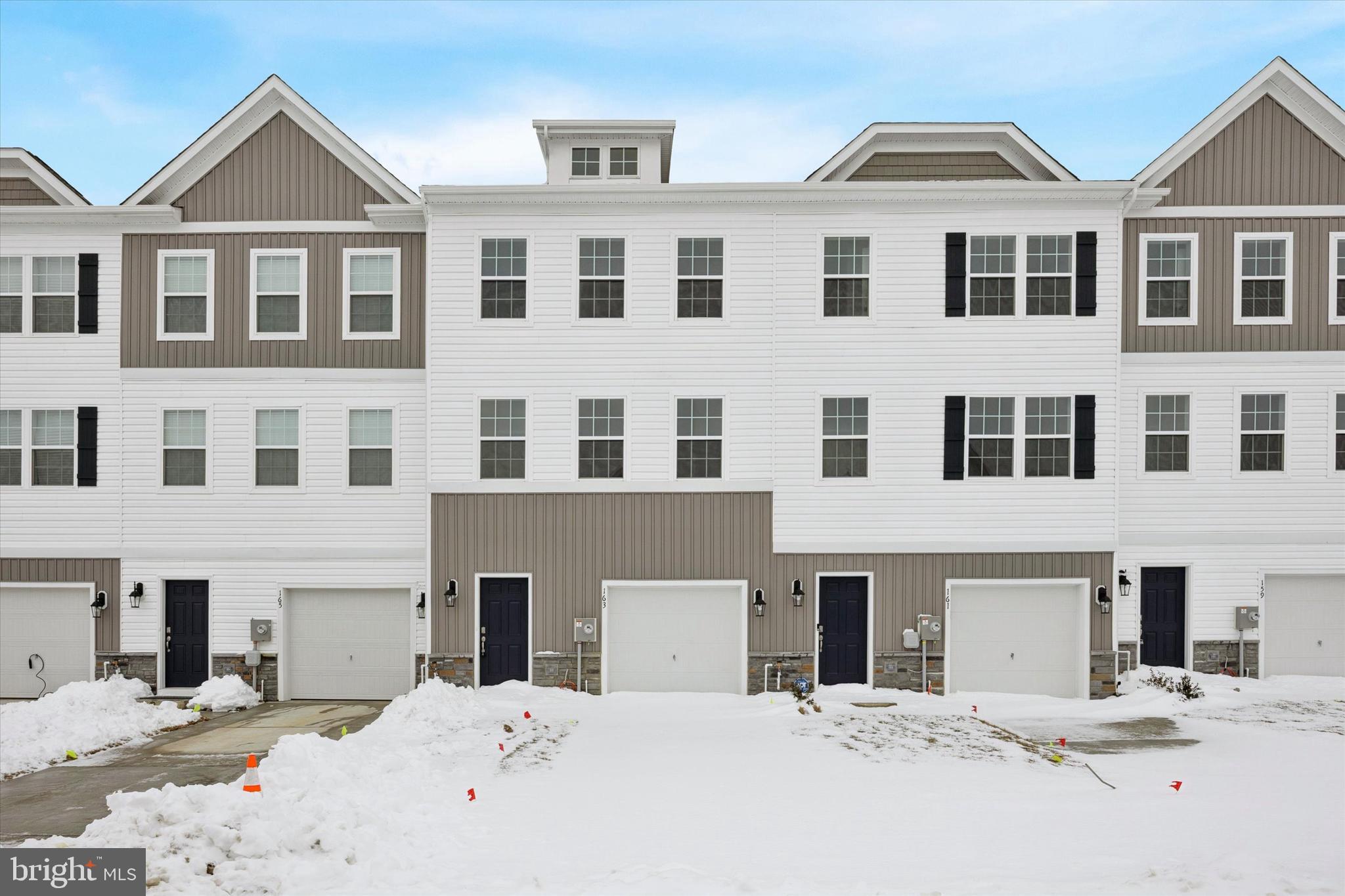 163 Sandy Rdg Road Sicklerville, NJ 08081 - Photo 30 of 30 a view of a white building with large windows