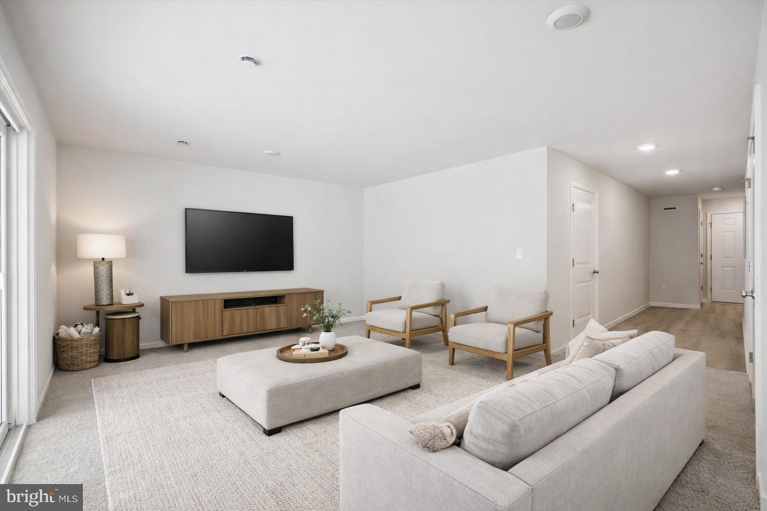 163 Sandy Rdg Road Sicklerville, NJ 08081 - Photo 3 of 30 a living room with furniture and a flat screen tv