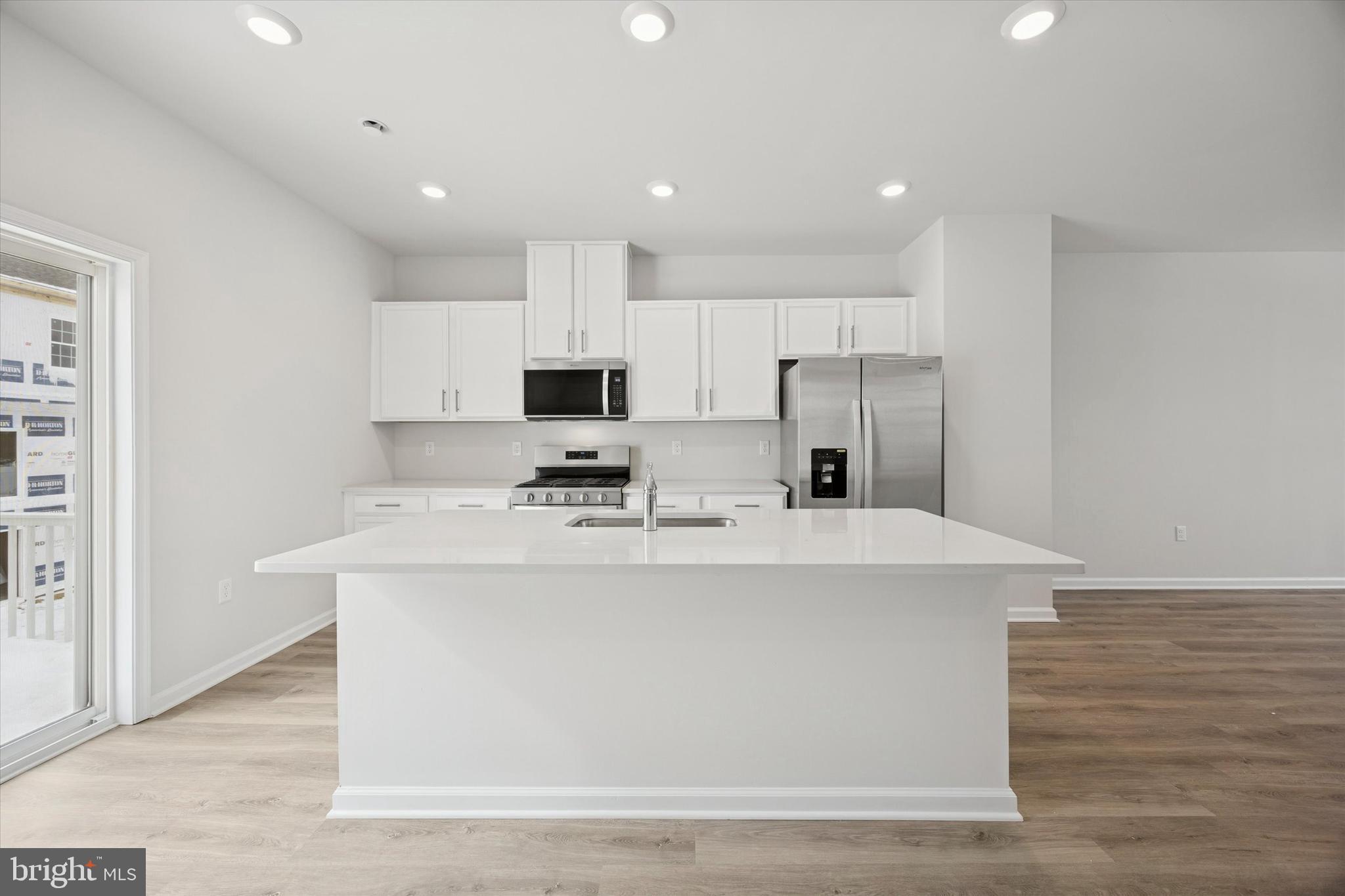 163 Sandy Rdg Road Sicklerville, NJ 08081 - Photo 8 of 30 a view of kitchen with stainless steel appliances refrigerator sink and stove