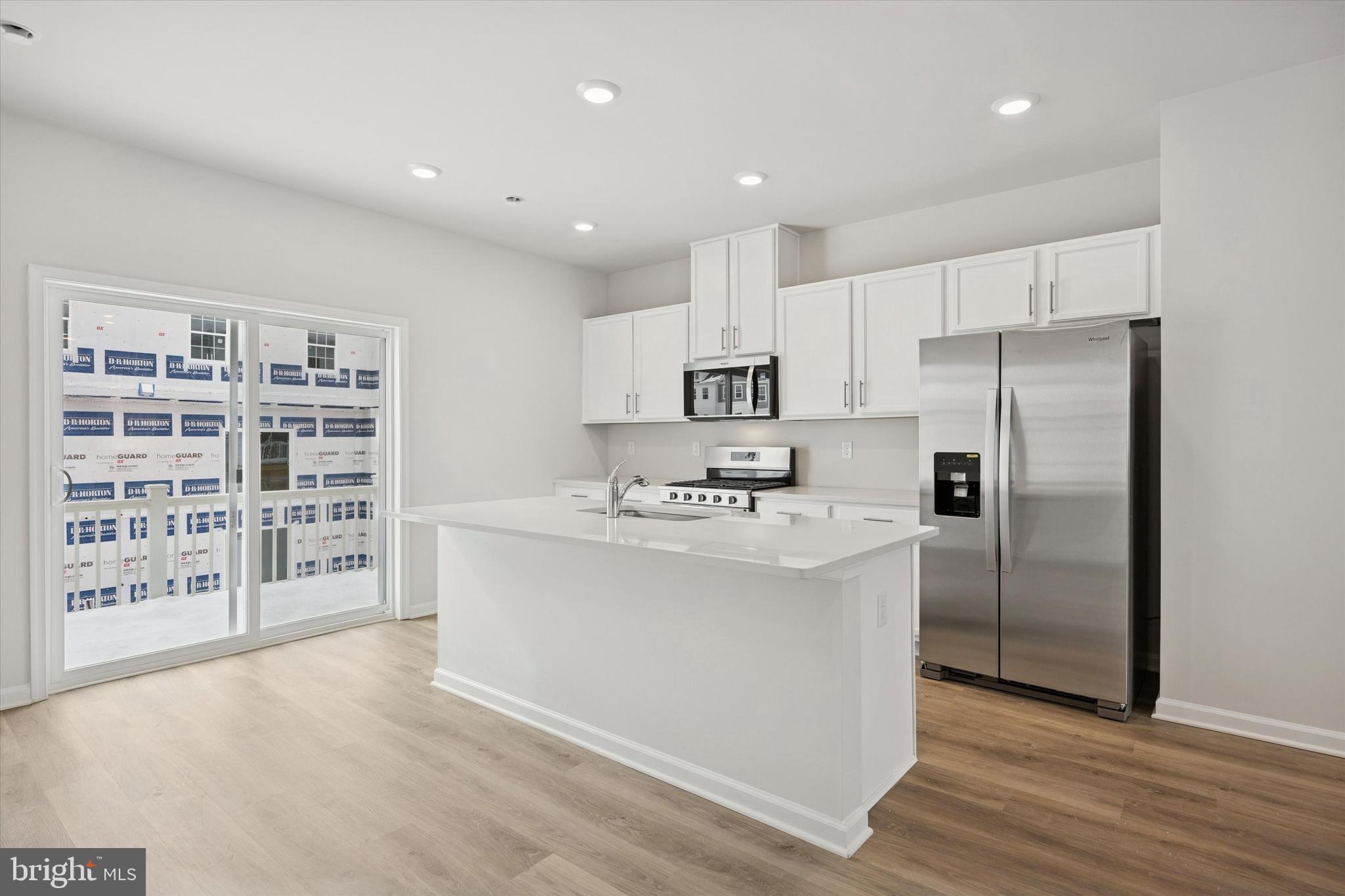 163 Sandy Rdg Road Sicklerville, NJ 08081 - Photo 10 of 30 a kitchen with stainless steel appliances a refrigerator sink and cabinets