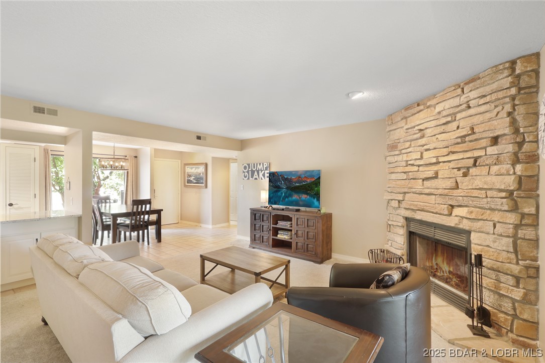 24 East Casa Del Rio, Unit 689 Lake Ozark, MO 65049 - Photo 15 of 31 Beautiful stone fireplace.