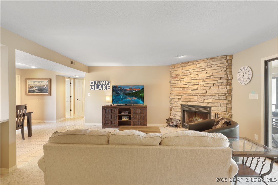24 East Casa Del Rio, Unit 689 Lake Ozark, MO 65049 - Photo 16 of 31 Living room with plenty room to entertain family o