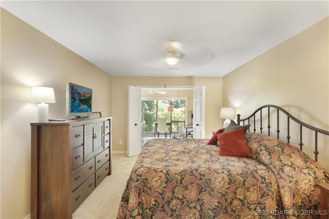 24 East Casa Del Rio, Unit 689 Lake Ozark, MO 65049 - Photo 18 of 31 Large master bedroom.