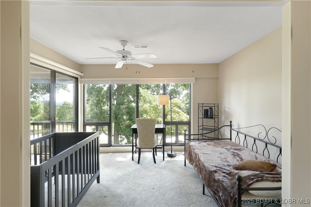 24 East Casa Del Rio, Unit 689 Lake Ozark, MO 65049 - Photo 21 of 31 Bonus room off of master bedroom could be nursery,