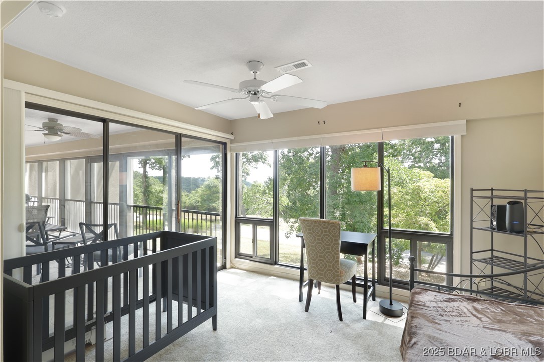 24 East Casa Del Rio, Unit 689 Lake Ozark, MO 65049 - Photo 22 of 31 Bonus room that has access to covered deck.