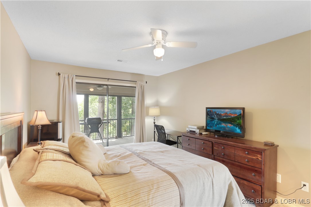 24 East Casa Del Rio, Unit 689 Lake Ozark, MO 65049 - Photo 25 of 31 Guest bedroom.