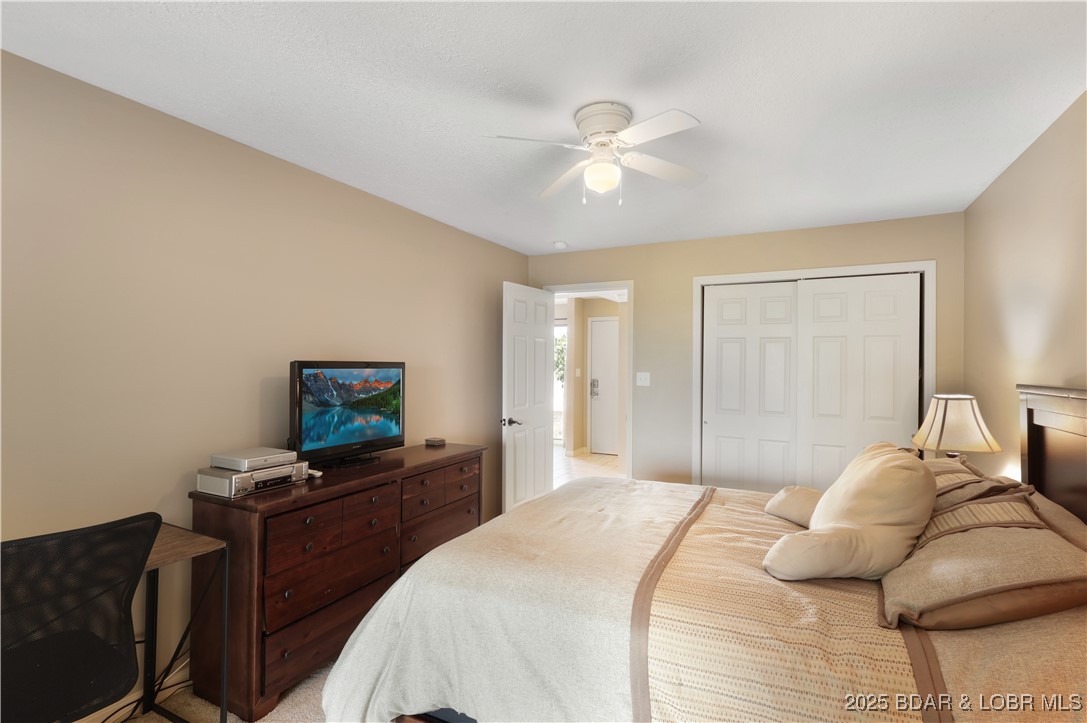 24 East Casa Del Rio, Unit 689 Lake Ozark, MO 65049 - Photo 26 of 31 Guest bedroom.
