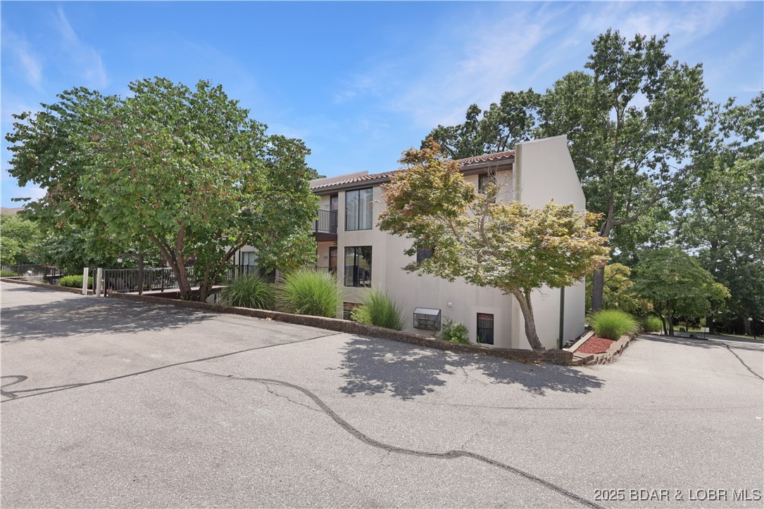 24 East Casa Del Rio, Unit 689 Lake Ozark, MO 65049 - Photo 3 of 31 #24 E. Casa Del Rio building.