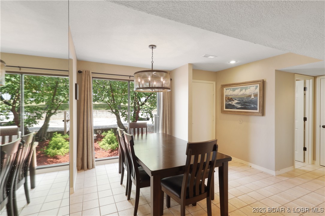 24 East Casa Del Rio, Unit 689 Lake Ozark, MO 65049 - Photo 8 of 31 Dining area close to front entrance.