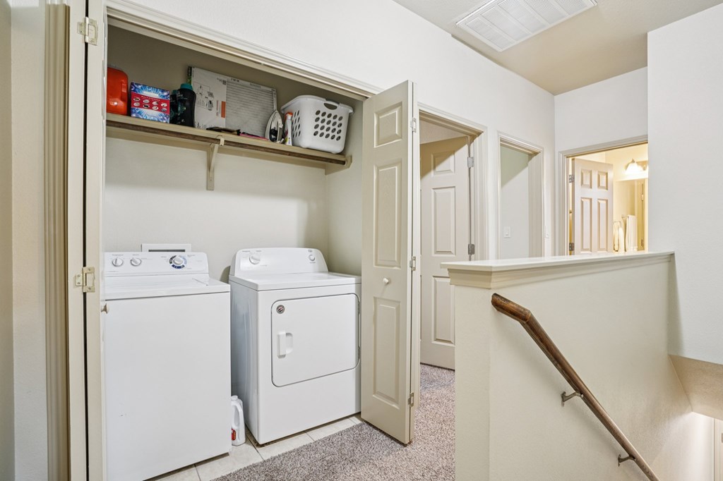 2312 Sailing Way Kerrville, TX 78028 - Photo 13 of 60 a utility room with dryer and washer
