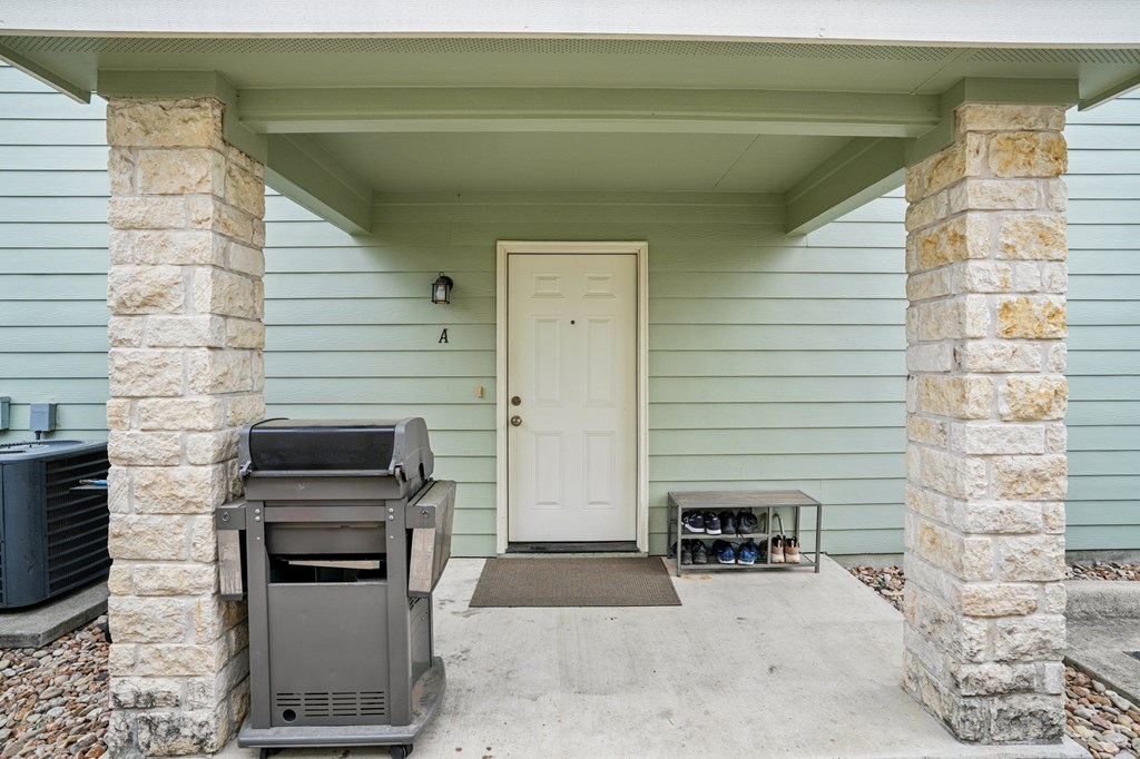 2312 Sailing Way Kerrville, TX 78028 - Photo 3 of 60 a view of a door and chair in the balcony