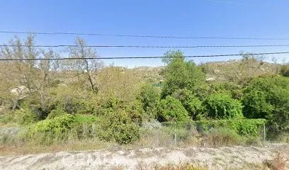 a view of a swimming pool and a yard