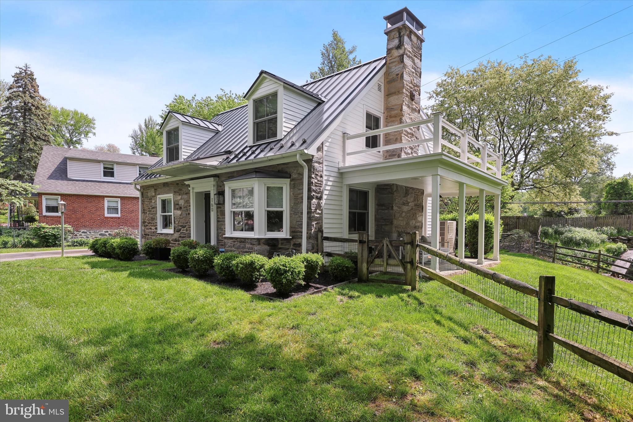 160 Rolling Road Bala Cynwyd, PA 19004 - Photo 1 of 35 a view of a house with backyard and garden