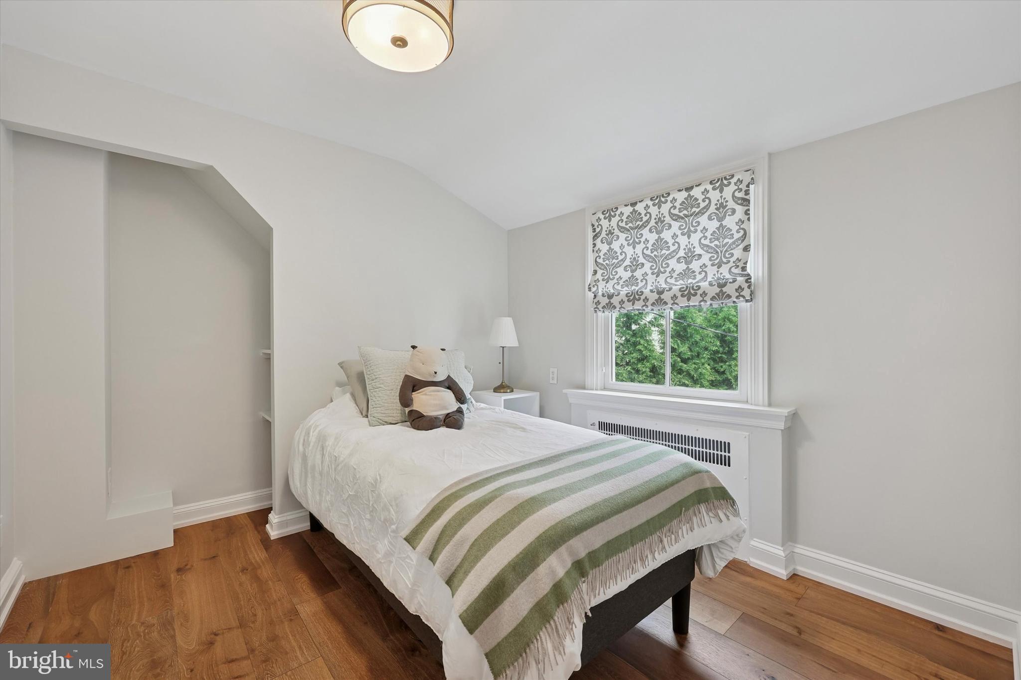 160 Rolling Road Bala Cynwyd, PA 19004 - Photo 12 of 35 a bedroom with a bed and a window